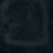 Distressed gray-black texture with granular pattern and tonal variations, creating depth through subtle light and dark areas, diffused lighting.